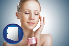 arizona a woman applying skin cream to her face