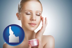 idaho map icon and a woman applying skin cream to her face