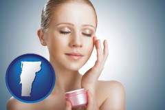 vermont map icon and a woman applying skin cream to her face