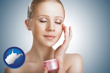 a woman applying skin cream to her face - with West Virginia icon